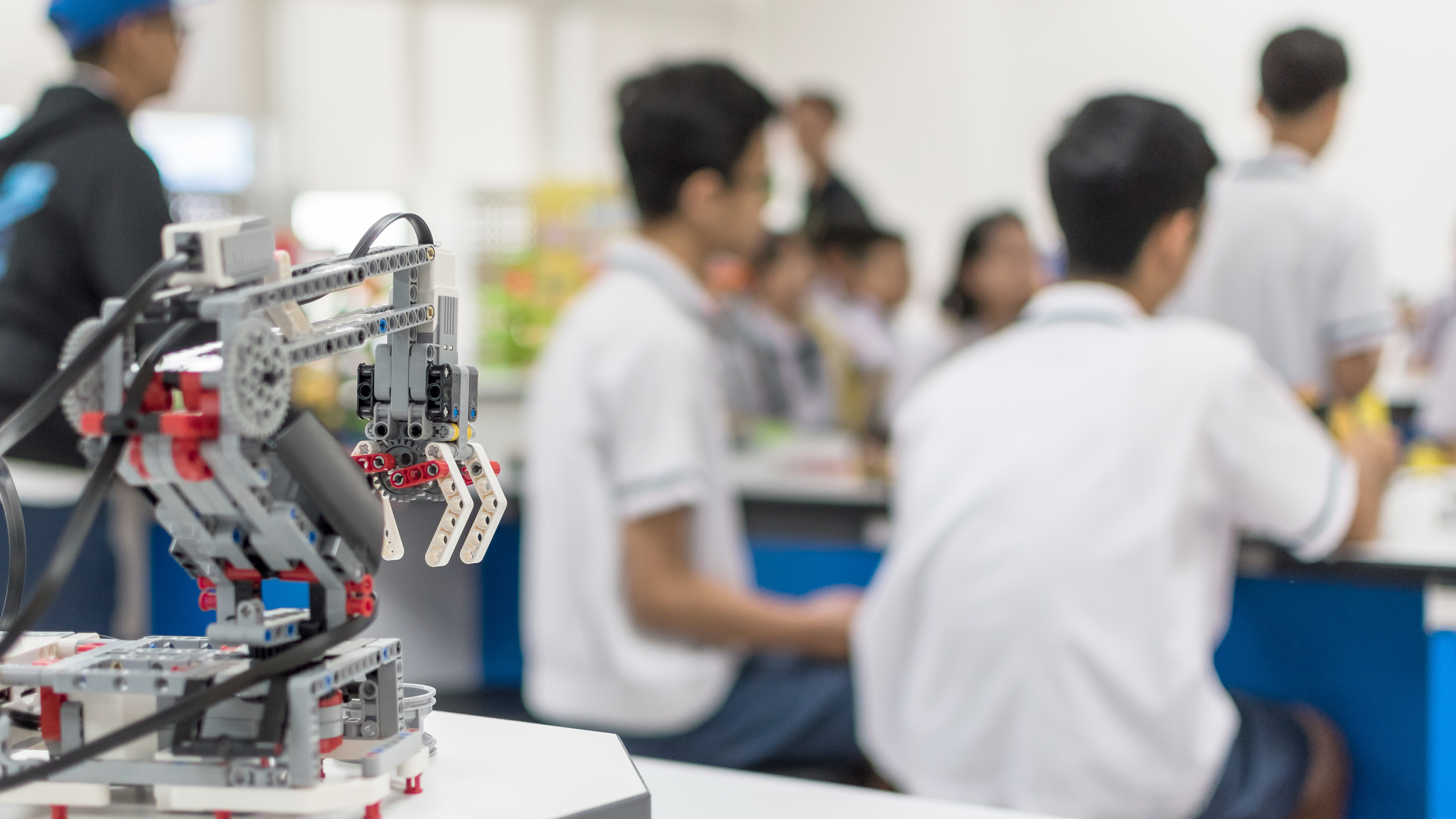 Students working with a STEM robotics project