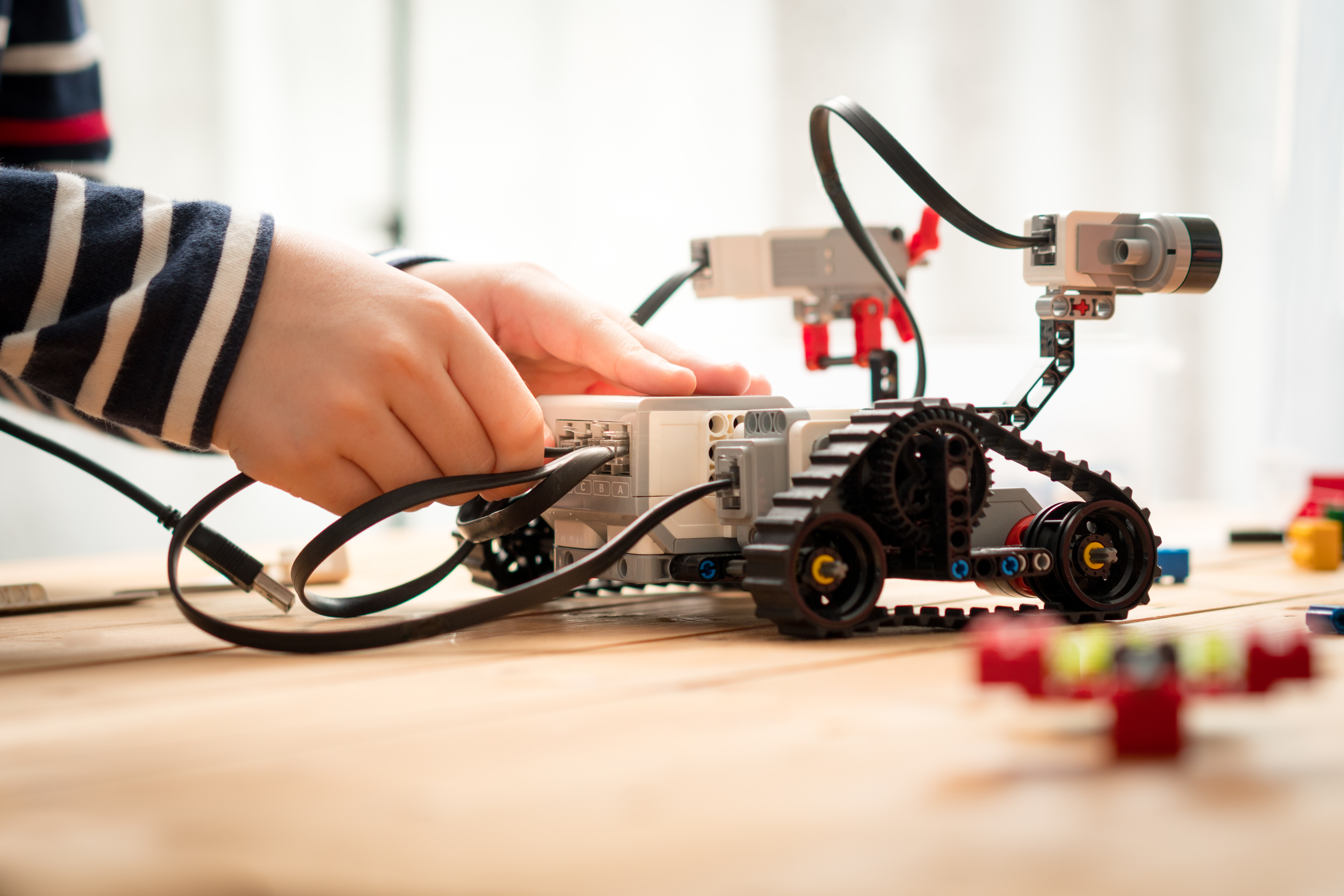 Students assembling a robot